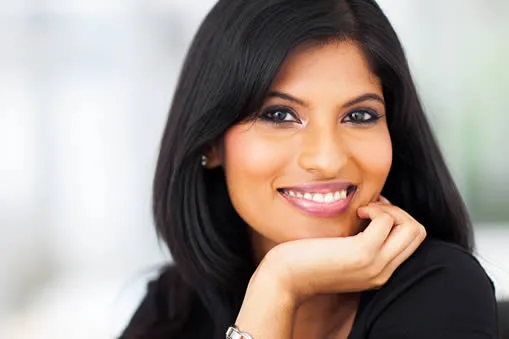 Woman with a beautiful smile after cosmetic dental bonding