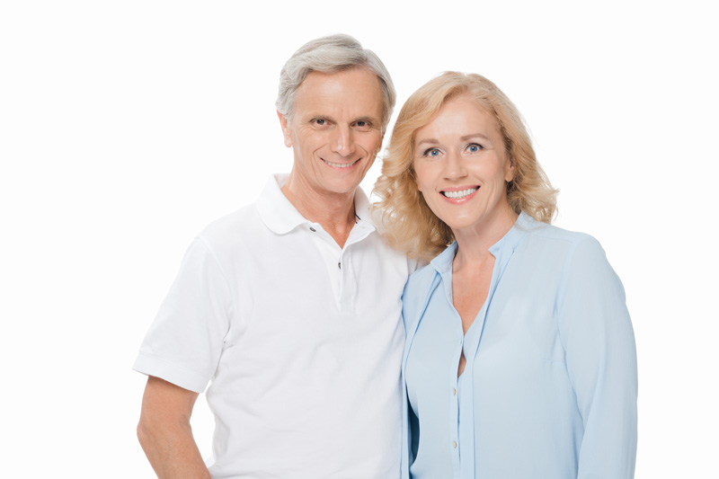 Smiling Older Couple On White Background