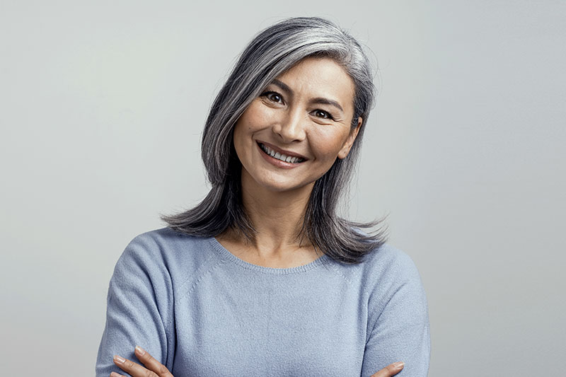 Attractive Older Woman Smiling With Gray Hair