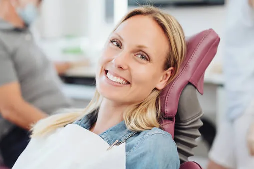 woman in dental chair smiling